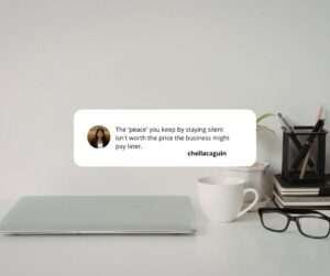 Professional workspace with a laptop and a quote about integrity and business ethics on a desk, representing professional integrity in digital marketing.